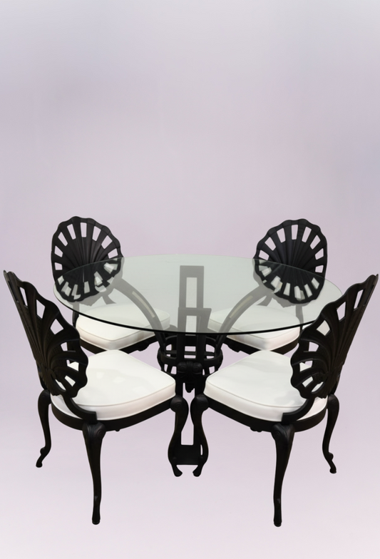 Make a commanding statement with The Eclipse Dining Set, a striking set that blends dramatic contrast with sophisticated design. Perfect for intimate dinners or an elegant breakfast nook, this grouping exudes modern, artistic glamour. This ensemble is the perfect choice for the discerning buyer looking to furnish a space with an artistic, Art Deco-inspired flair and unforgettable visual impact.