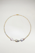 Luminous faceted opals meet the organic elegance of three baroque pearls. A shimmering, one-of-a-kind statement finished with a seamless gold magnetic clasp.