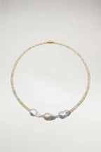 Luminous faceted opals meet the organic elegance of three baroque pearls. A shimmering, one-of-a-kind statement finished with a seamless gold magnetic clasp.