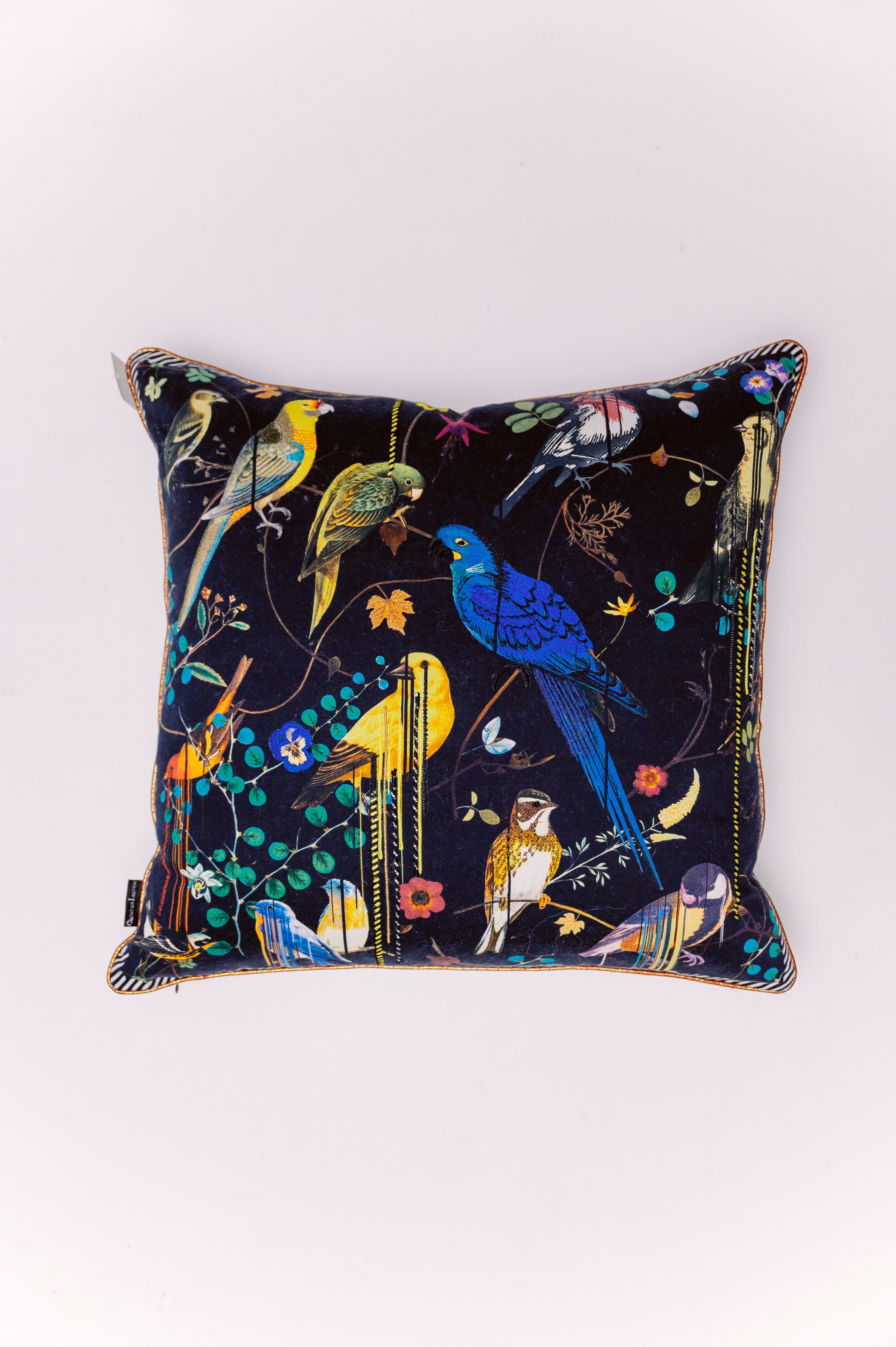 Discover two distinct moods in one captivating design with The Aviary Reversible Pillow. This exquisite piece brings the vibrant beauty of a lush garden into your home, offering unmatched versatility. Both sides feature the same luxurious, smooth fabric that beautifully captures the intricate details and vivid colors of the illustration. Whether you prefer the dramatic allure of a nocturnal garden or the fresh charm of a sun-drenched aviary, this pillow allows you to effortlessly transform your space.