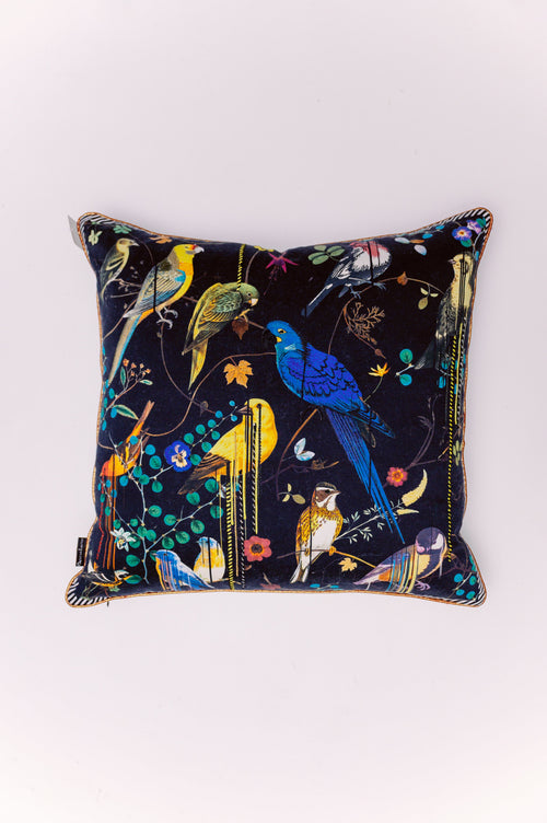 Discover two distinct moods in one captivating design with The Aviary Reversible Pillow. This exquisite piece brings the vibrant beauty of a lush garden into your home, offering unmatched versatility. Both sides feature the same luxurious, smooth fabric that beautifully captures the intricate details and vivid colors of the illustration. Whether you prefer the dramatic allure of a nocturnal garden or the fresh charm of a sun-drenched aviary, this pillow allows you to effortlessly transform your space.