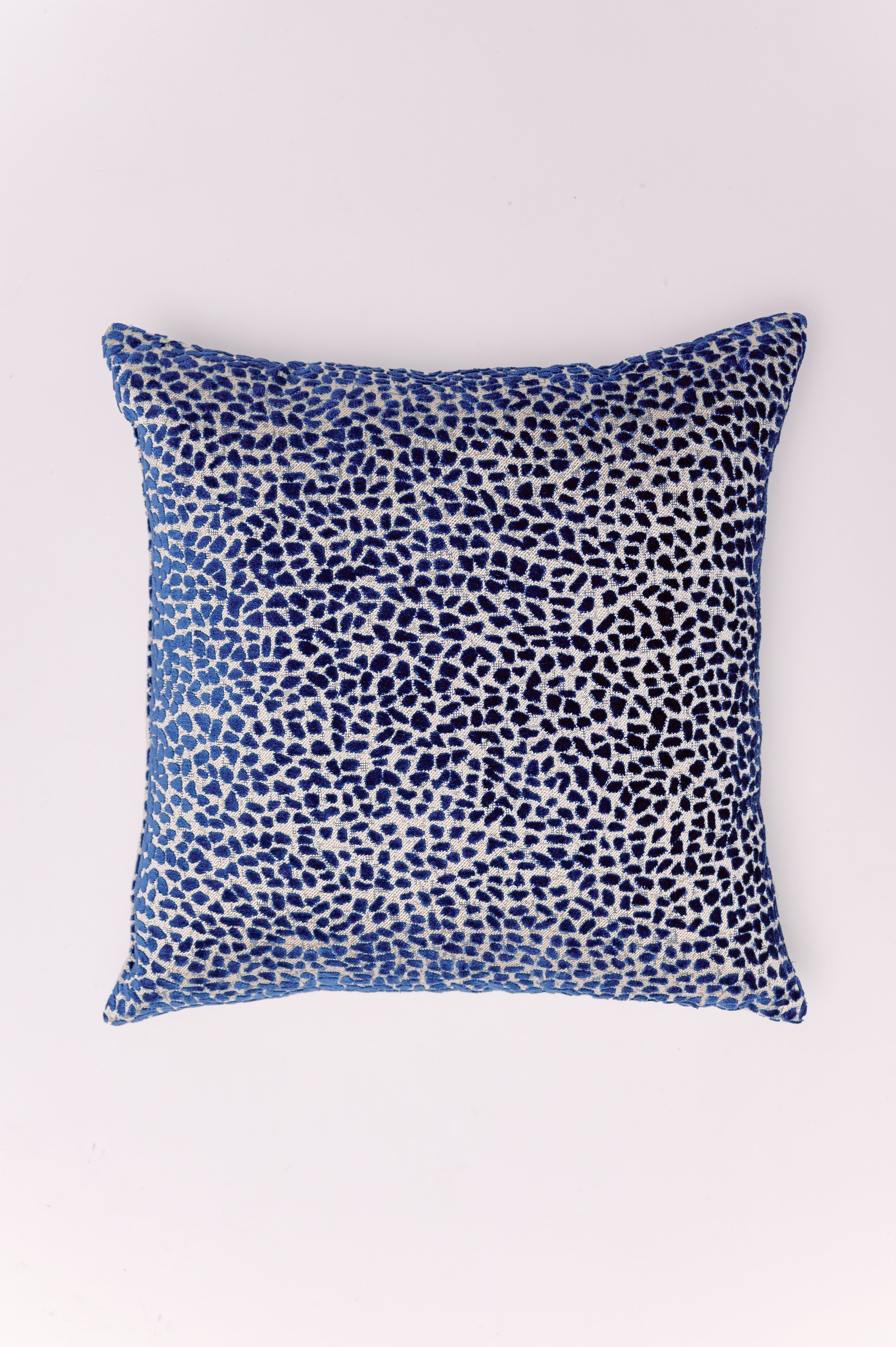 Elevate your décor with the tactile beauty of The Azure Textured Jacquard Pillow. This design features a tight, micro-pattern that reads as both abstract and organic. The intricate pattern and luxurious feel make it an artful alternative to traditional solids, offering a sophisticated way to introduce both color and high-end texture into your living space.