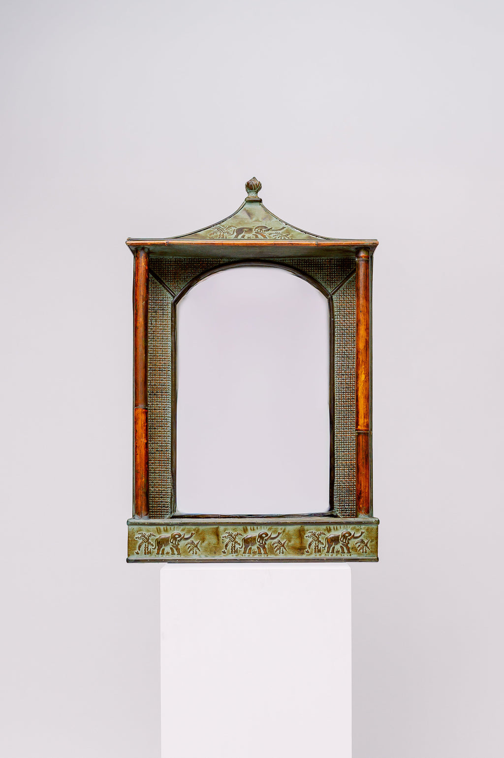 Vintage elephant pagoda mirror with bamboo and rattan details, and storage space in the bottom.