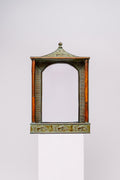 Vintage elephant pagoda mirror with bamboo and rattan details, and storage space in the bottom.