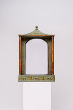 Vintage elephant pagoda mirror with bamboo and rattan details, and storage space in the bottom.