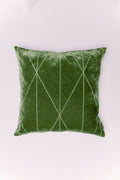 Introduce depth and luxury to your space with The Emerald Lattice Pillow. Crafted from plush, shimmering crushed velvet in a vibrant, jewel-toned emerald green, this piece is a true statement maker. The design is subtly enhanced by a clean, stitched geometric pattern that creates an elegant, diamond-like grid. This delicate contrast of texture and line adds a modern architectural touch to the pillow's vintage-inspired glamour. It's the perfect way to add a sophisticated pop of color and rich texture to a so