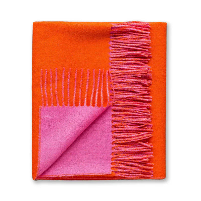 Hand-loomed from pure baby alpaca, it is soft, luminous, and effortlessly refined.