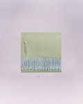 Hand-loomed from pure baby alpaca, it is soft, luminous, and effortlessly refined.