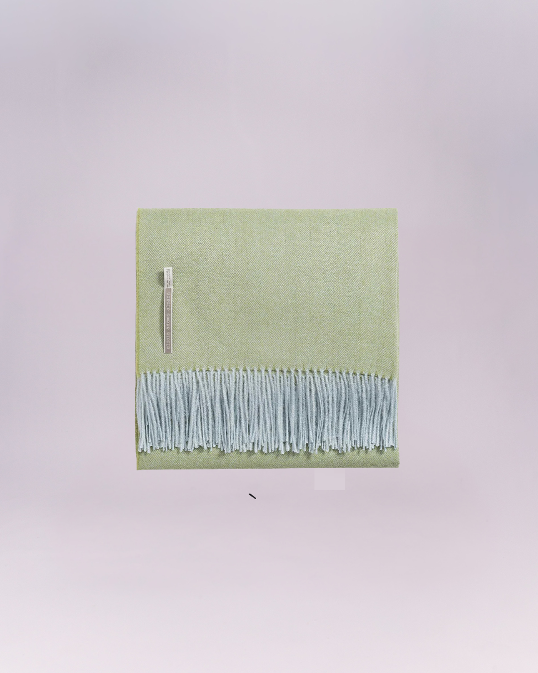 Hand-loomed from pure baby alpaca, it is soft, luminous, and effortlessly refined.