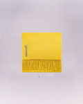 Hand-loomed from pure baby alpaca, it is soft, luminous, and effortlessly refined.
