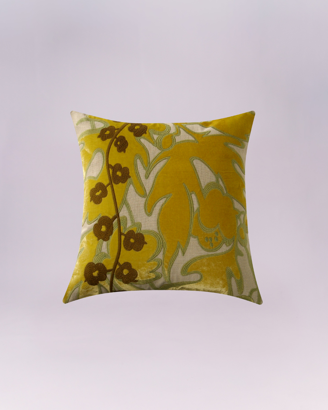 Brighten up any room with this luxurious and richly textured decorative cushion! It features a bold, oversized mustard yellow velvet leaf and floral design layered over a natural beige base. The pillow is further embellished with delicate brown embroidered flowers trailing across the front. The combination of velvet texture and embroidery gives it a vintage, yet highly sophisticated look.