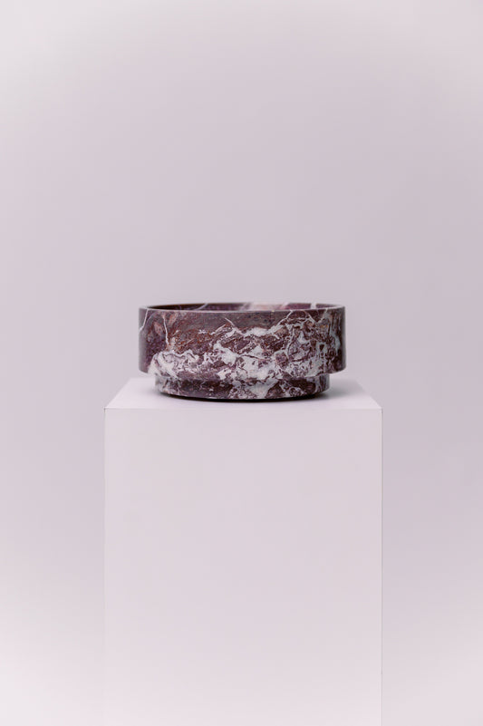 An elegant marble serving bowl perfect for any occasion.