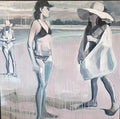 Three beach goers in pink, black and gray