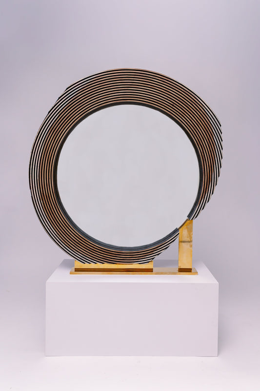 This one-of-a-kind custom wood mirror is a sculptural, statement piece with a bold and modern design.