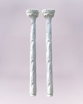 Pair of Serge Roche–style palmette torchiere lamps. These wall-mounted, palm-tree–inspired floor lamps are cast in fiberglass with a warm, layered patina that mimics painted plaster. Their streamlined, sculptural palm-leaf design gives them a modern yet timeless look. Each stands 82" tall and measures 13" wide by 6.5" deep.