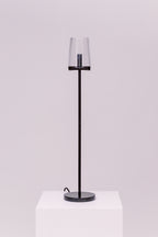 Created by renowned lighting designer Jonathan Browning, this table lamp distills the hurricane lamp to its essence. Inspired by French fixtures of the 1940s, its hand-blown shades are a traditional tapered shape, while the solid brass frame offers a modern counterpoint.