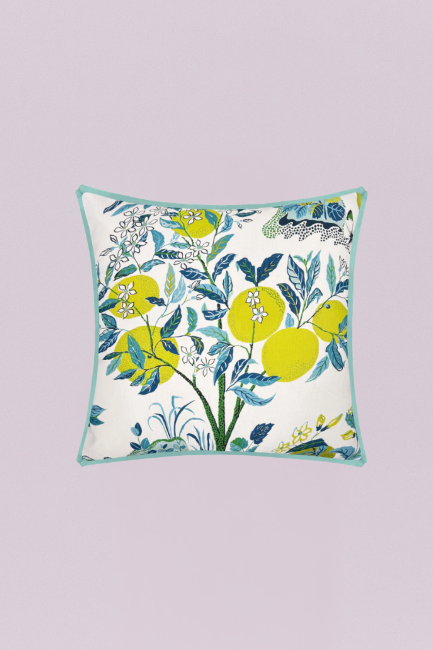 A fresh, vibrant outdoor-style pillow featuring stylized yellow citrus fruits and blossoms among lush navy and teal leaves on a white ground. The crisp light blue piping adds a final touch, making it perfect for a sunroom or patio.