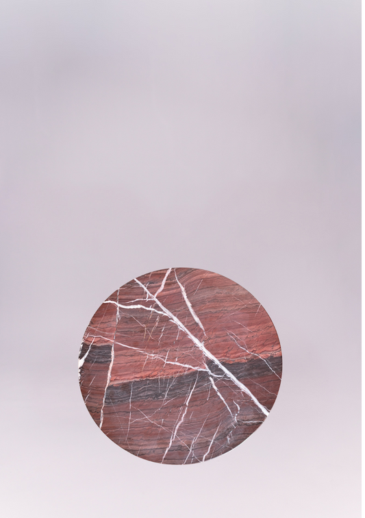 Perfect for the discerning collector, this table functions beautifully as a luxurious end table next to a sofa, an unconventional nightstand, or a stunning pedestal to showcase art. It's a heavy, high-impact piece that anchors a room with its natural beauty and modern architectural form.