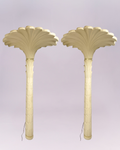 Channel the iconic glamour of French designer Serge Roche with this breathtaking pair of vintage palm tree torchere floor lamps. Each lamp is a dramatic sculptural statement, expertly crafted from molded resin with a creamy, plaster-like finish that captures the Neoclassical elegance of the Art Deco era. $3,500.00each