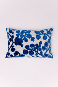 Bring the rich color and texture of a secret garden indoors with The Royal Hydrangea Lumbar. This exquisite pillow features a bold, classic botanical motif in a striking two-tone design. Deep, plush sapphire blue velvet forms the delicate leaves and vines, standing out vividly against a crisp, textured cream background. The soft velvet appliqué gives the floral pattern a raised, dimensional feel, transforming the pillow into a piece of art.