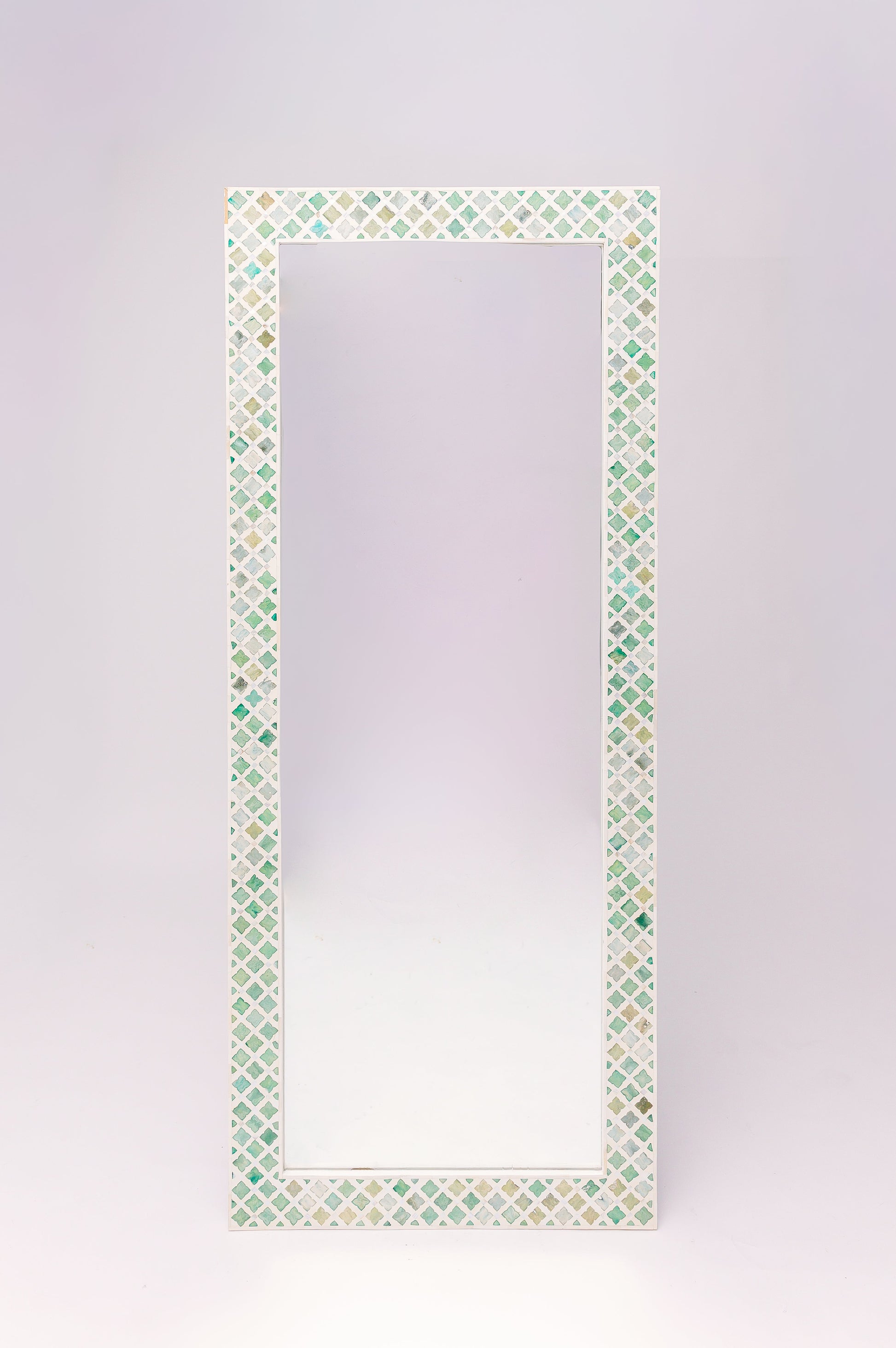 This gorgeous Moroccan mosaic patterned bone-inlay mirror in soft green and neutral tones, gives a fresh look to any space.