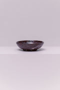 A stunning marble bowl, perfect to hold your favorite small accessories.