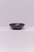 A stunning marble bowl, perfect to hold your favorite small accessories.