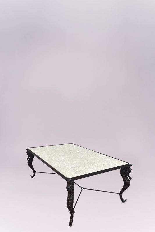 Decorative table with marble top and black metal legs on a light purple background