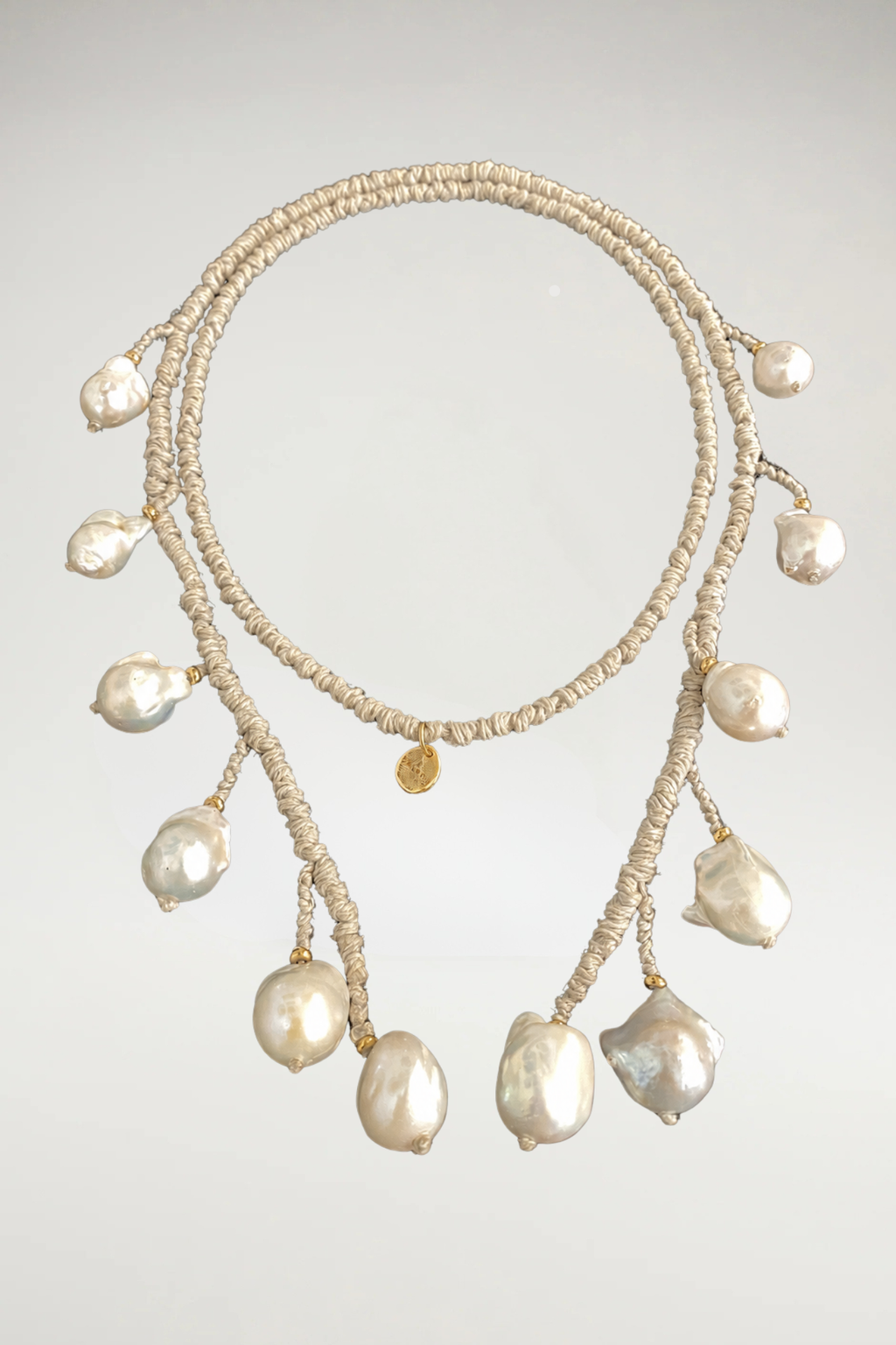 Natural linen 12 baroque pearl drop lariat necklace with hand-wrapped detailing and organic freshwater pearl accents.
