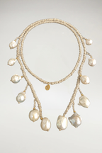Natural linen 12 baroque pearl drop lariat necklace with hand-wrapped detailing and organic freshwater pearl accents.