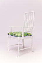 Classic faux-bamboo styling meets a splash of poolside personality. With its crisp refurbished antique in high gloss white frame. Upholstery fabric is by Ferrick Mason in Calliandra, this armchair is ready to bring a sunny, tropical breeze straight into your favorite corner. Set includes 6 armless chairs and two arm head chairs.
