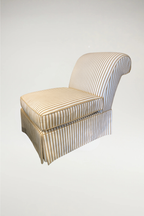 Elevate your living space with this sophisticated Cabana Slipper Chair, featuring a timeless tan and white vertical stripe pattern. This piece seamlessly blends an elegant, regal aesthetic with a cozy and inviting feel, making it a versatile addition to high-end interiors.