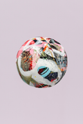 A truly unique, spherical accent pillow featuring a dynamic, multi-color abstract print that resembles street art or expressionist painting. With bold splatters of pink, white, black, blue, and orange, this artistic piece adds a playful, modern dimension and unexpected shape to any space.