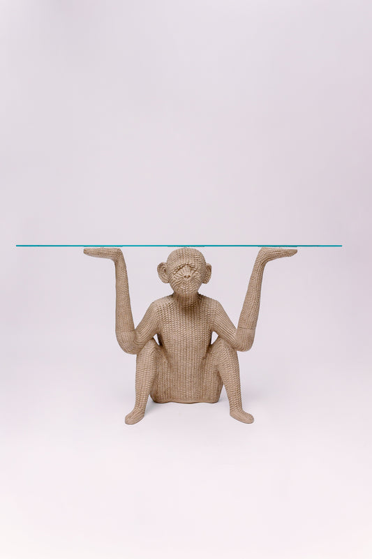 This vintage console table is made of resin to resemble woven wicker/reed,  inspired by the designs of Mario Lopez Torres. The table is 3 pieces, the arms separate from the body for ease of moving.