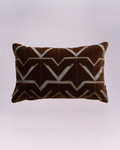 More than just a throw pillow—it’s art! Sumptuous dark brown velvet is accented with a dynamic, interlocking geometric motif. The perfect blend of rich, cozy texture and sharp, contemporary design.